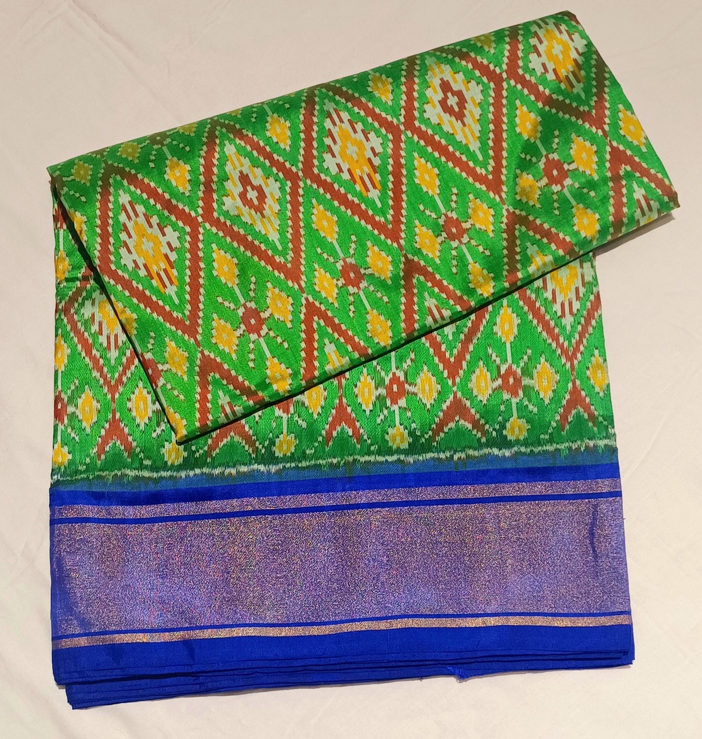 Parrot Green with Dark Blue border Pochampally Ikkat Tie and Dye Pure silk Saree