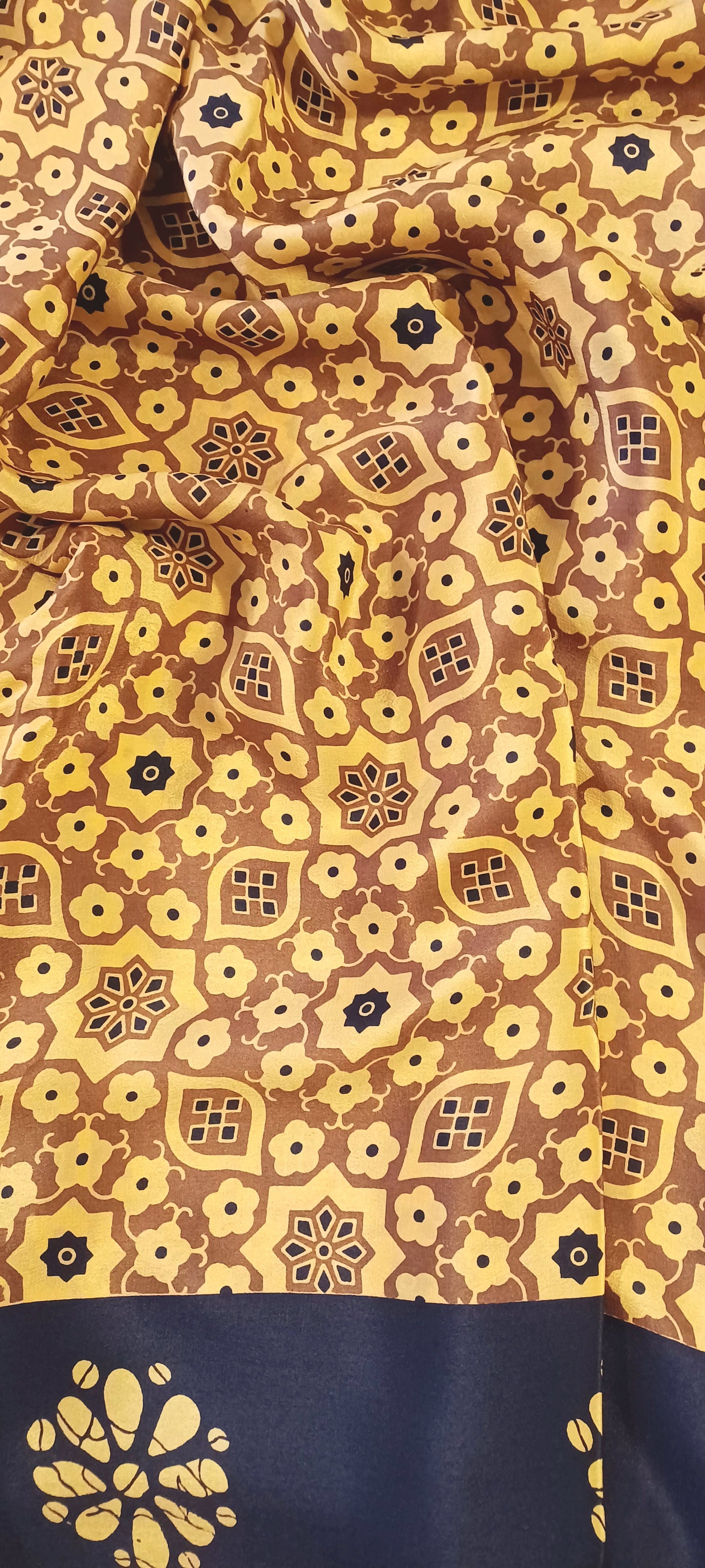 Mustard Yellow and black printed Pure Crepe Silk Saree