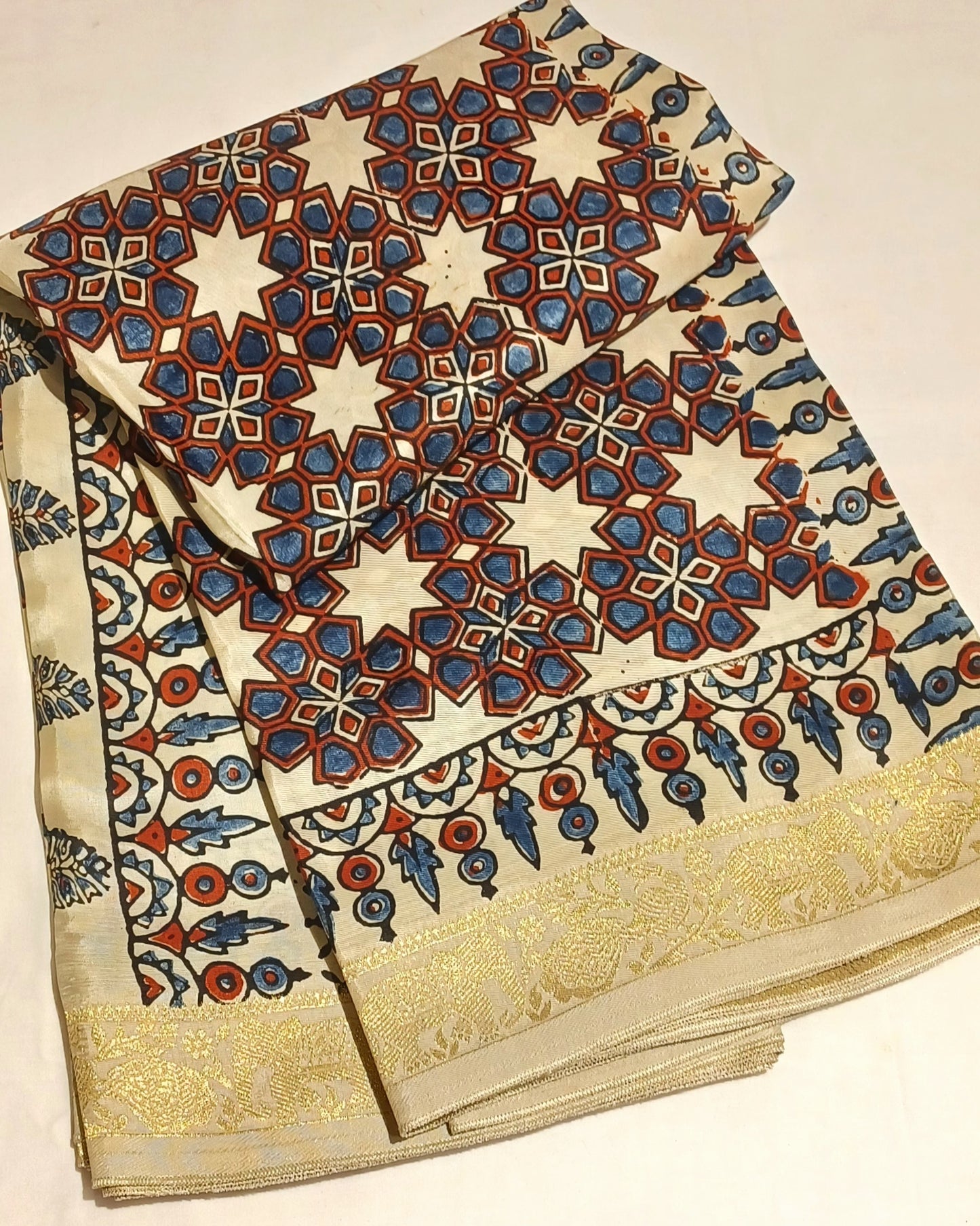 Off-white Dola Silk with Indigo and Red Ajrakh print saree
