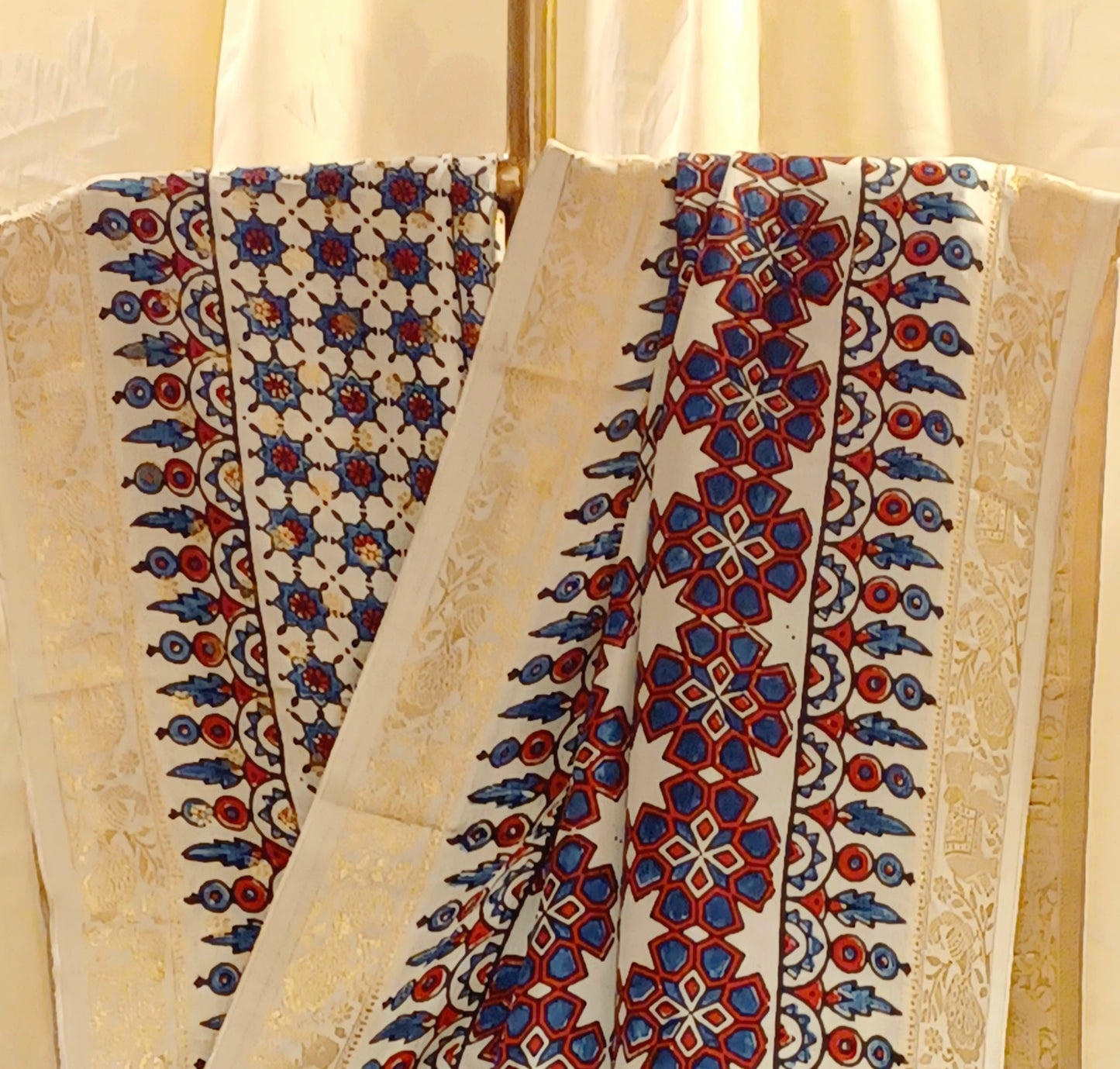 Off-white Dola Silk with Indigo and Red Ajrakh print saree
