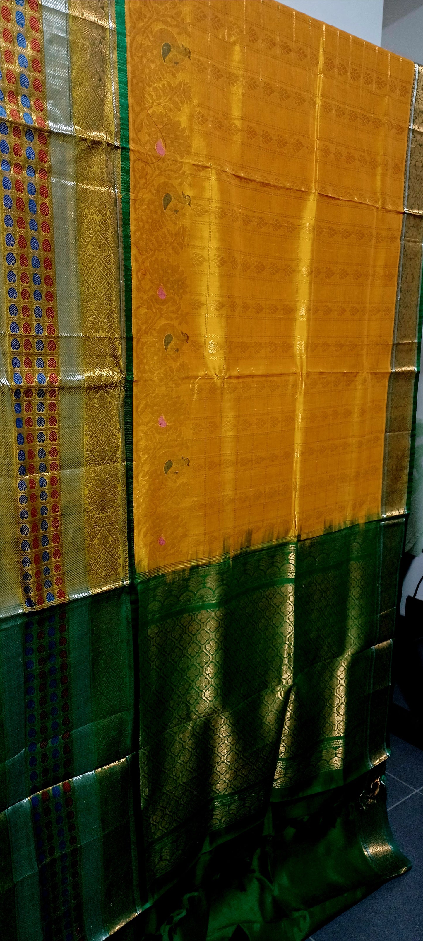 Mango yellow with green and zari woven big border Kanchi Kuppadam saree