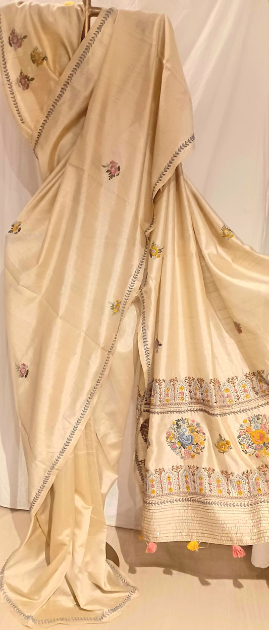 Beige semi Tussar silk saree with hand embroidery