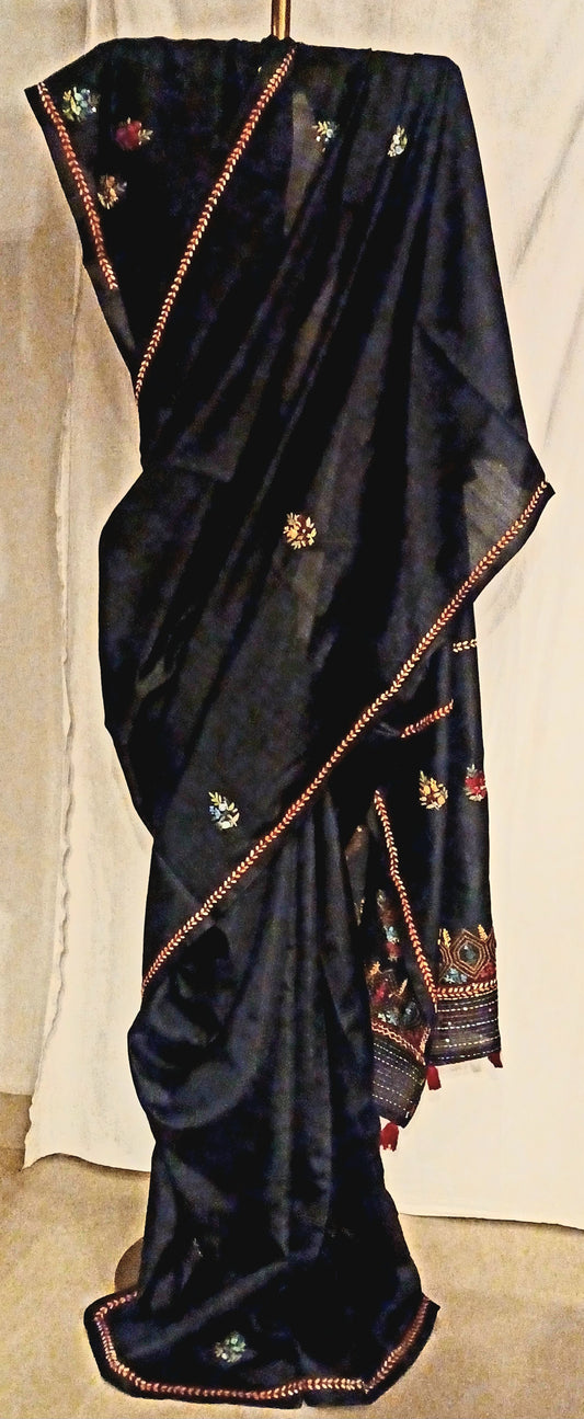Black semi Tussar silk saree with hand embroidery