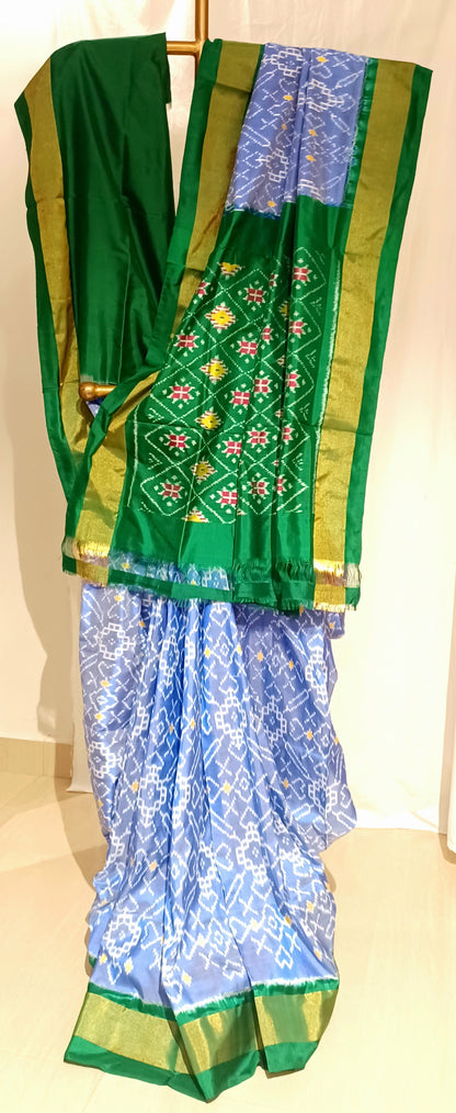 Lavendar Blue with Dark Green border Pochampally Ikkat Tie and Dye Pure silk Saree