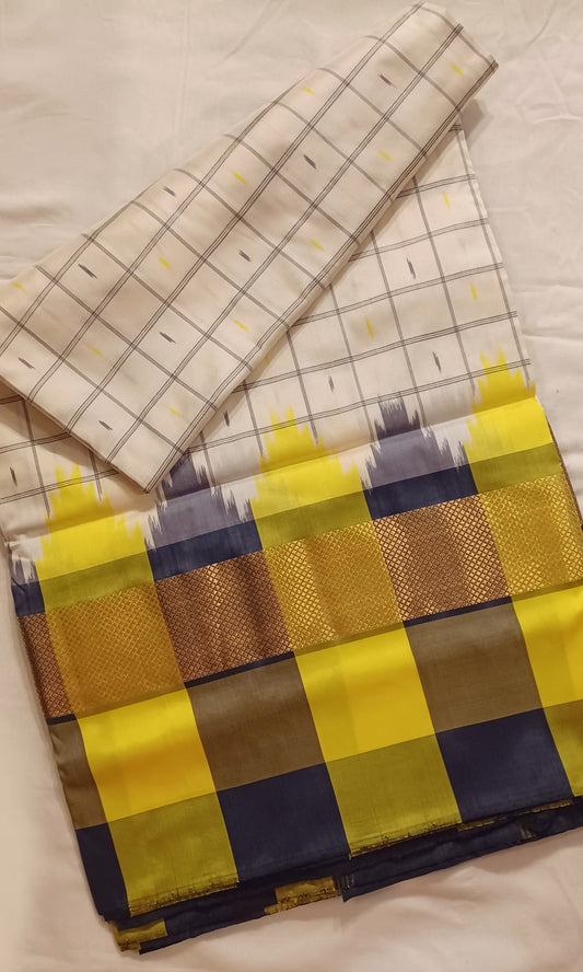 Off-white with double colour border Pochampally Ikkat Tie and Dye Pure silk Saree