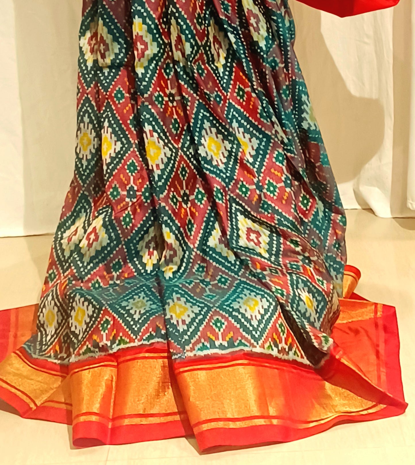 Dark Green with Red border Pochampally Ikkat Tie and Dye Pure silk Saree