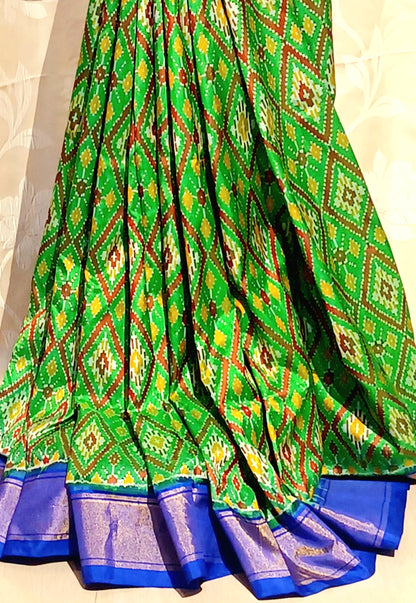 Parrot Green with Dark Blue border Pochampally Ikkat Tie and Dye Pure silk Saree