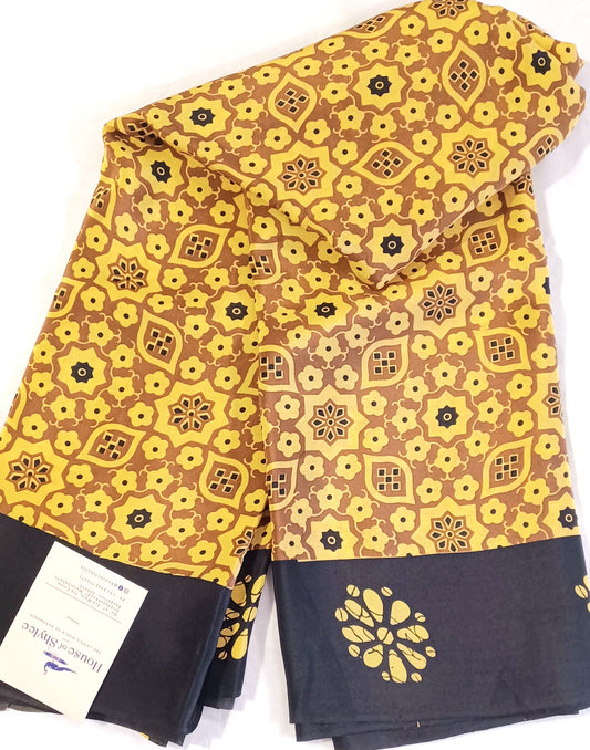Mustard Yellow and black printed Pure Crepe Silk Saree