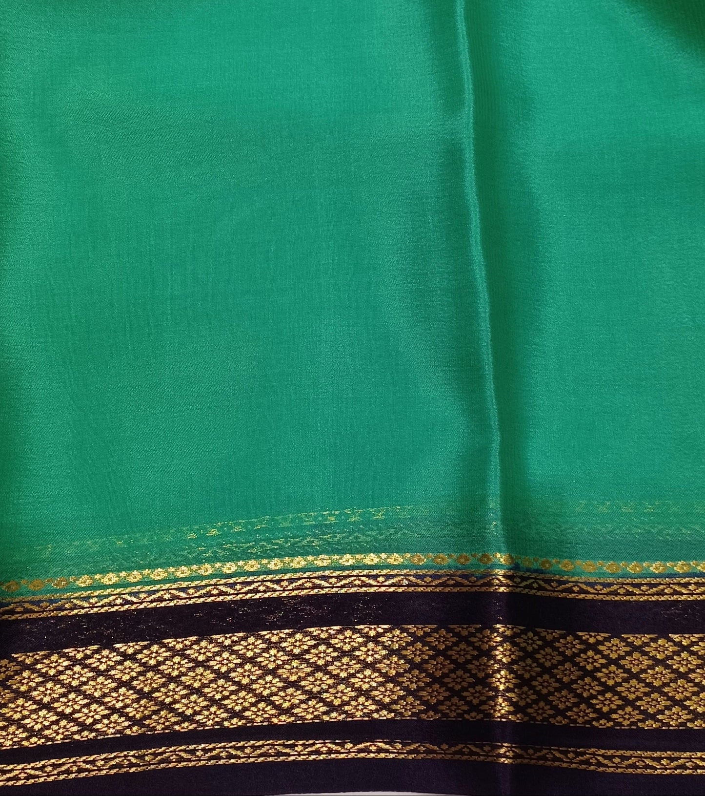Light rama green with Dark brown border Pure Silk Pure Zari Mysore Crepe Saree