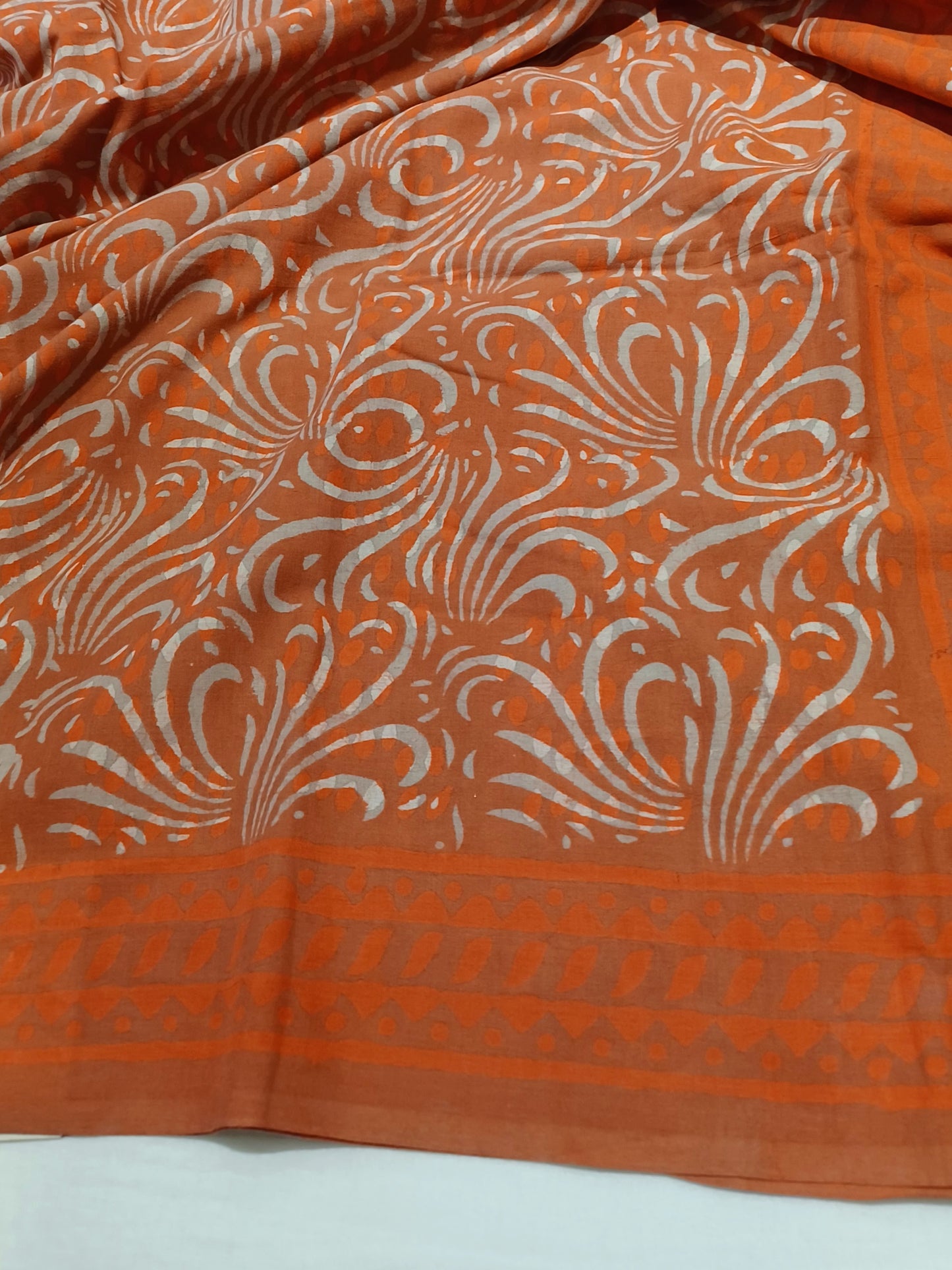 Orange Dabu handblock printed cotton saree