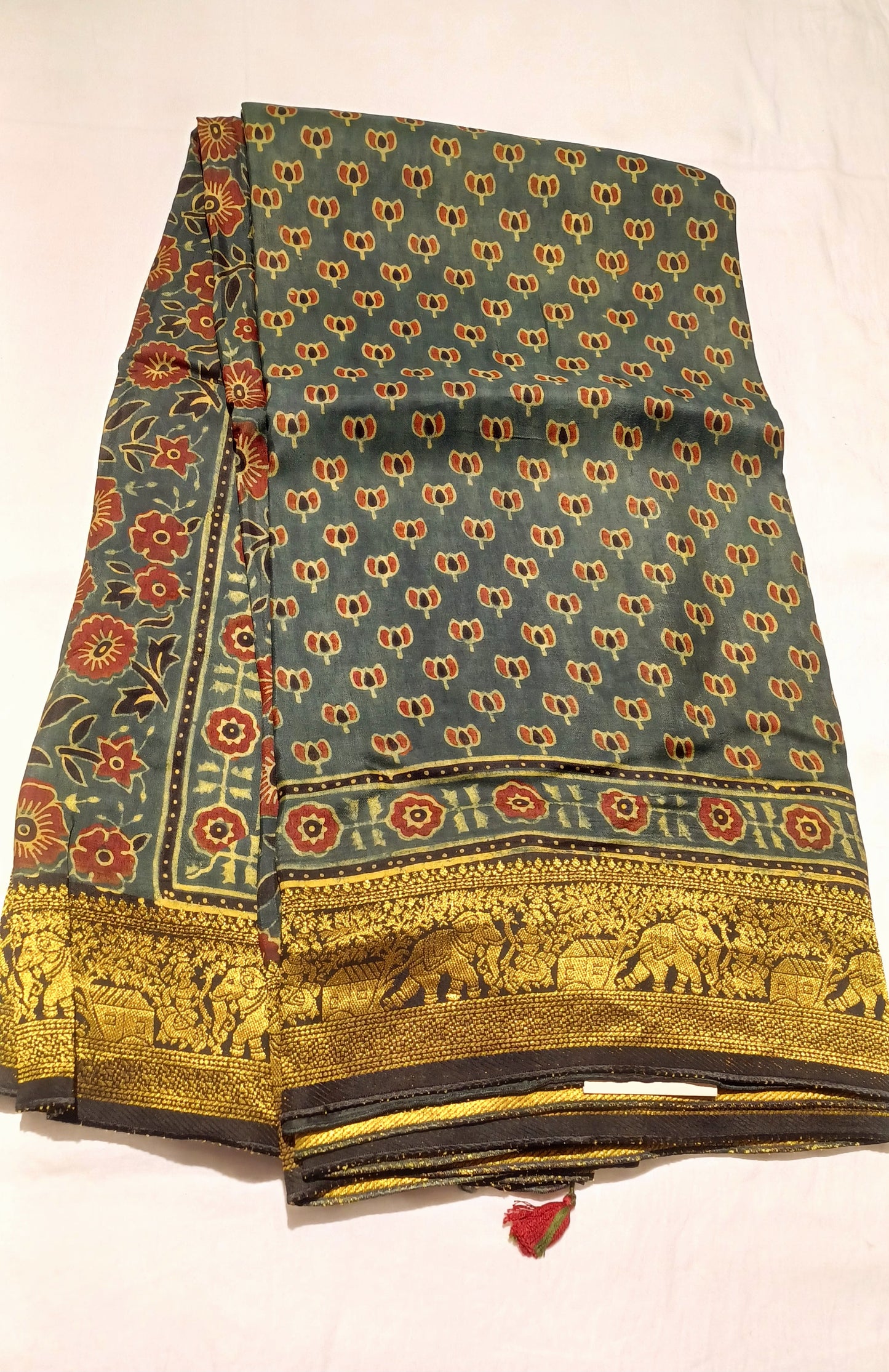 Dark Green Dola silk Ajrakh print saree