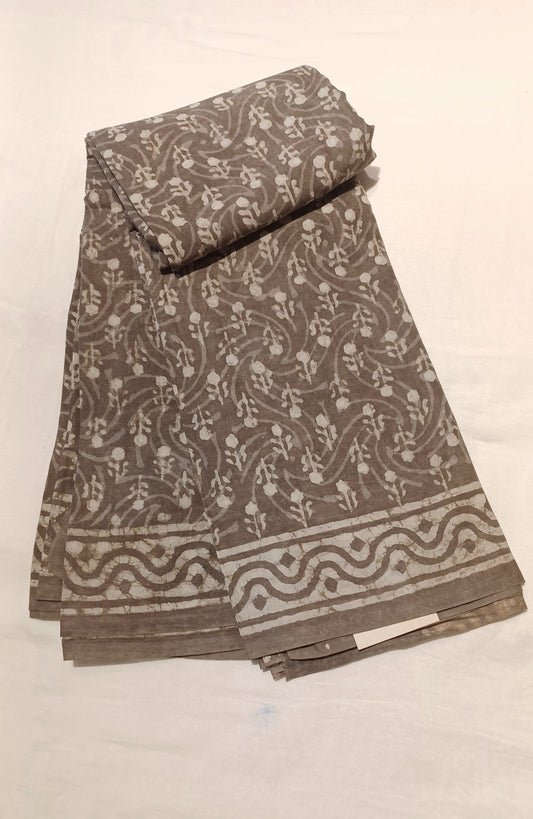 Brownish grey soft cotton dabu handblock print saree folded