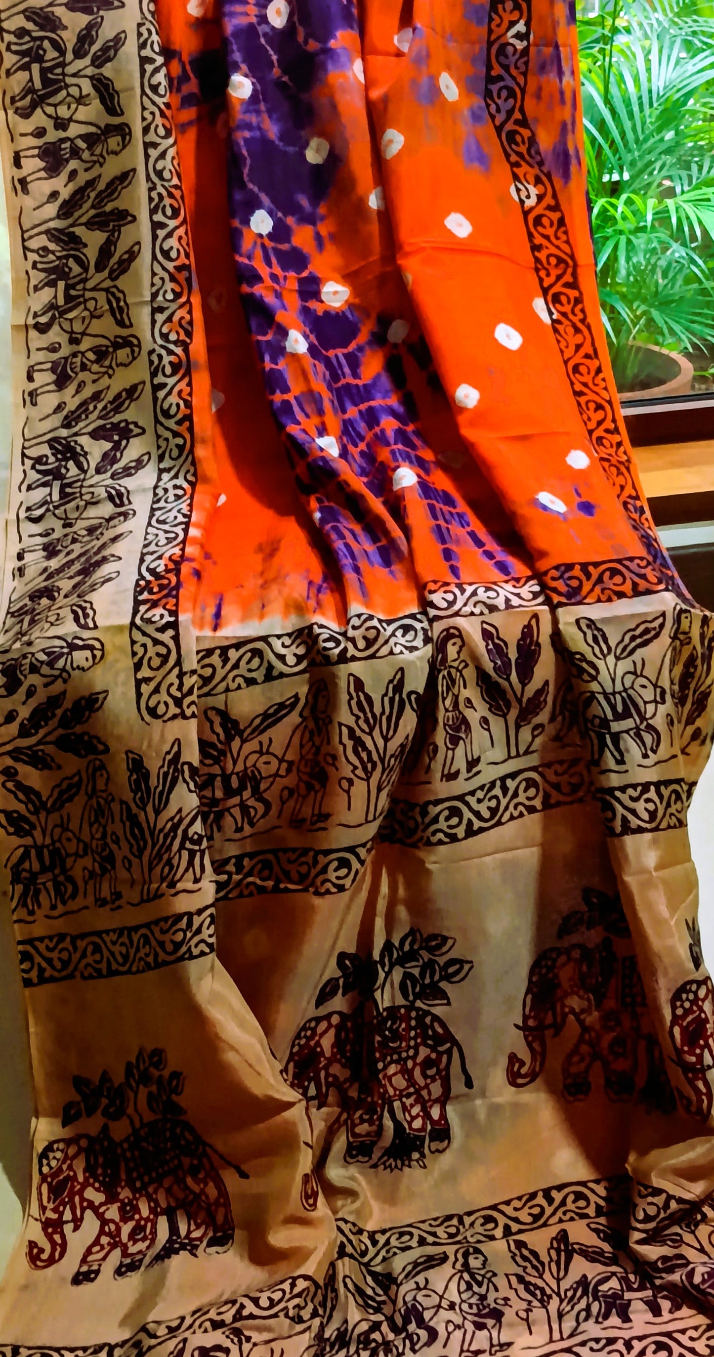 Bright Orange Handcrafted Chennuri Silk saree with Bandhani and Kalamkari